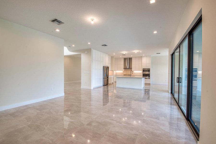 Furnished interior view inside a new home in Apex at Avenir, Palm Beach Gardens (Image 40).