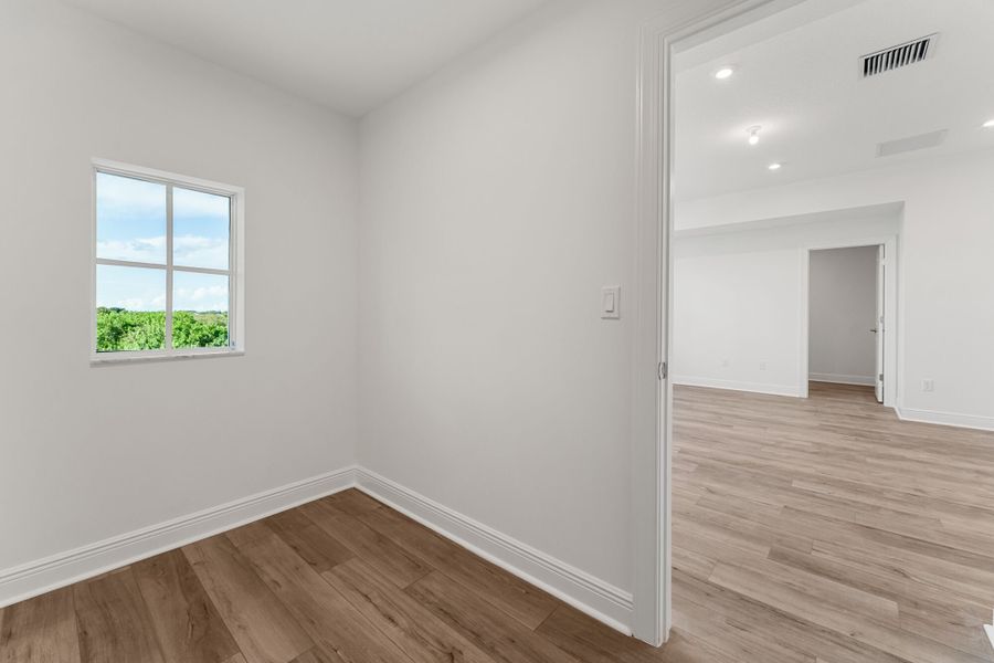 Representative unfurnished interior of a home built from the Zinnia by Mattamy Homes in Newfield - Rosette Park, Palm City (Image 17).
