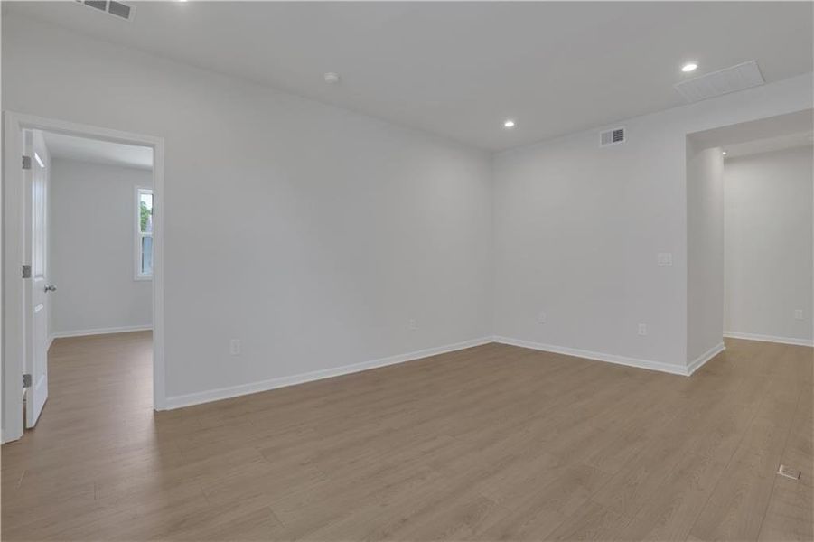 Spacious, unfurnished interior of a new home in The Paddocks at Doc Hughes, Buford (Image 42).