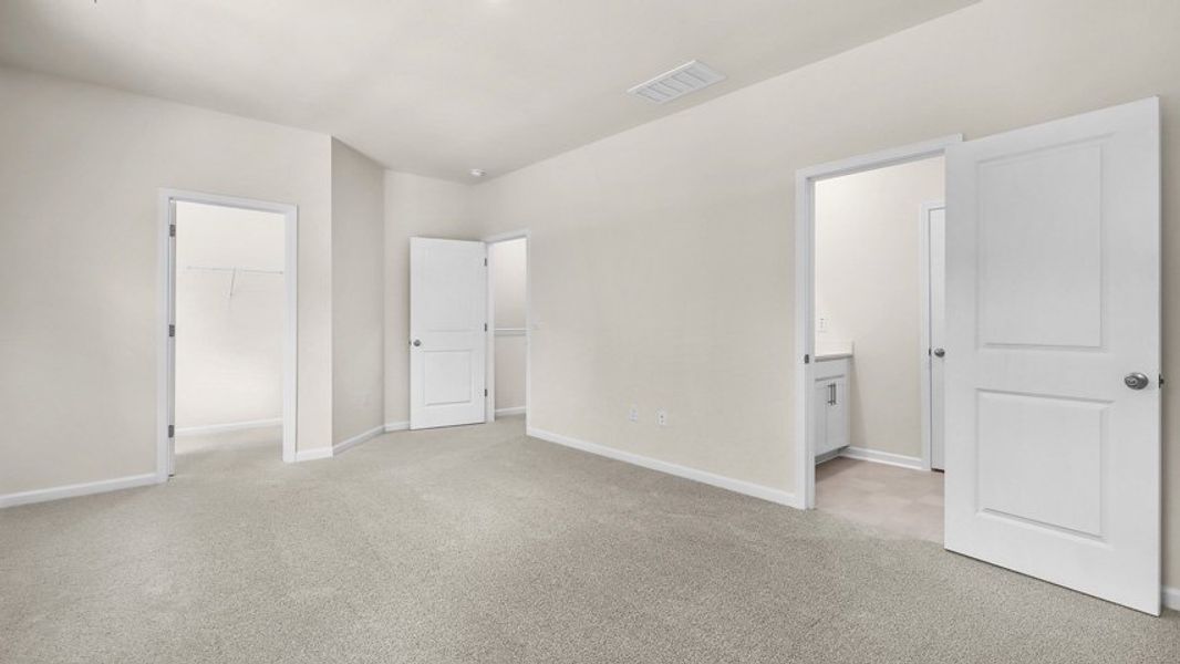 Spacious, unfurnished interior of a new home in The Townes at Madden West, Fuquay Varina (Image 13).