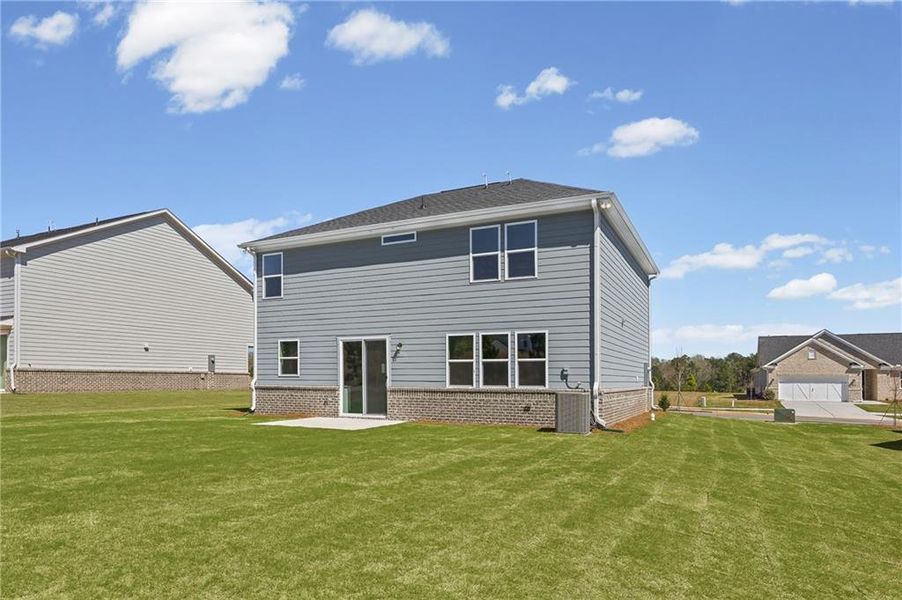 Exterior details and patio area of a home in Overland, Locust Grove (Image 19).