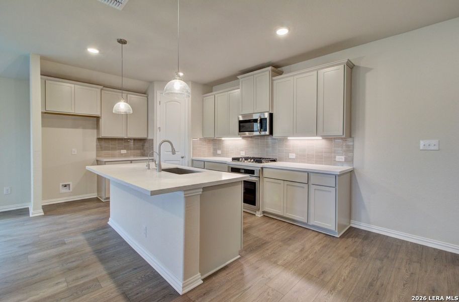 Furnished interior view inside a new home in Stream Waters, Seguin (Image 5).