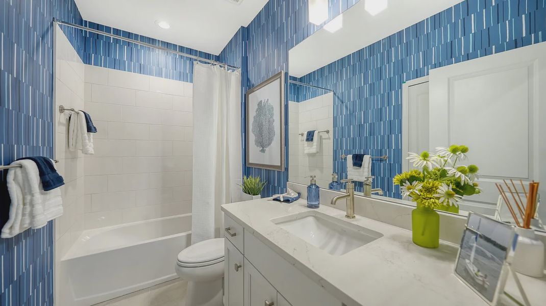 Representative furnished interior of a home built from the Avery by Neal Communities in SkySail, Naples (Image 6).