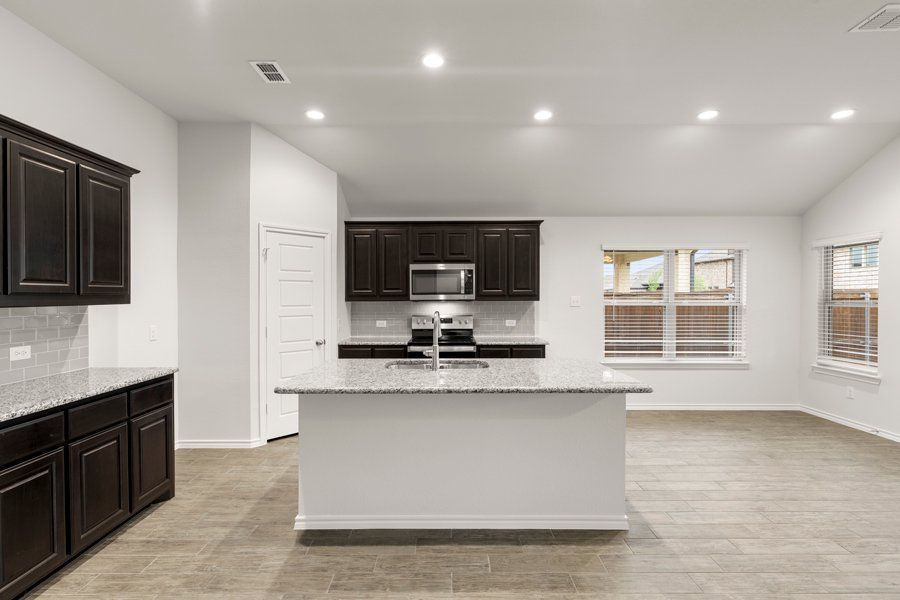 Representative exterior photo of a completed home built from the Cheyenne by Impression Homes in DeBerry Reserve, Royse City, TX (Image 4).