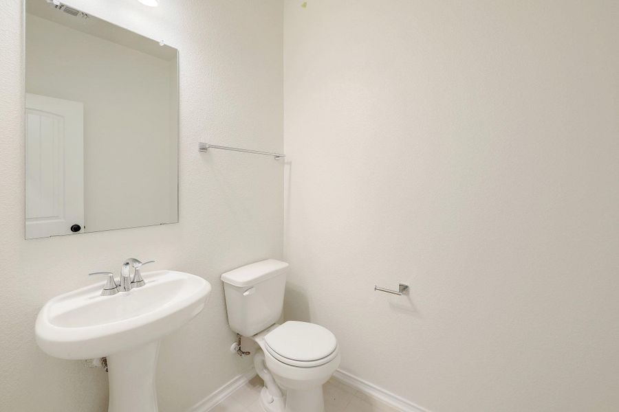 Furnished interior view inside a new home in River Bluff, Leander (Image 11).