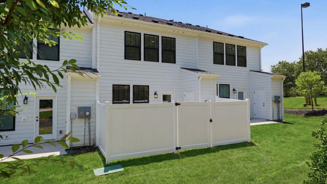Exceptional outdoor living begins with a private backyard in this thoughtfully designed home at Gresham Station