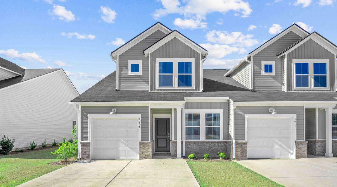 Front exterior of a new home in The Preserve, Hardeeville, SC, highlighting curb appeal (Image 1). Front exterior of a new home in The Preserve, Hardeeville, SC, highlighting curb appeal (Image 1).