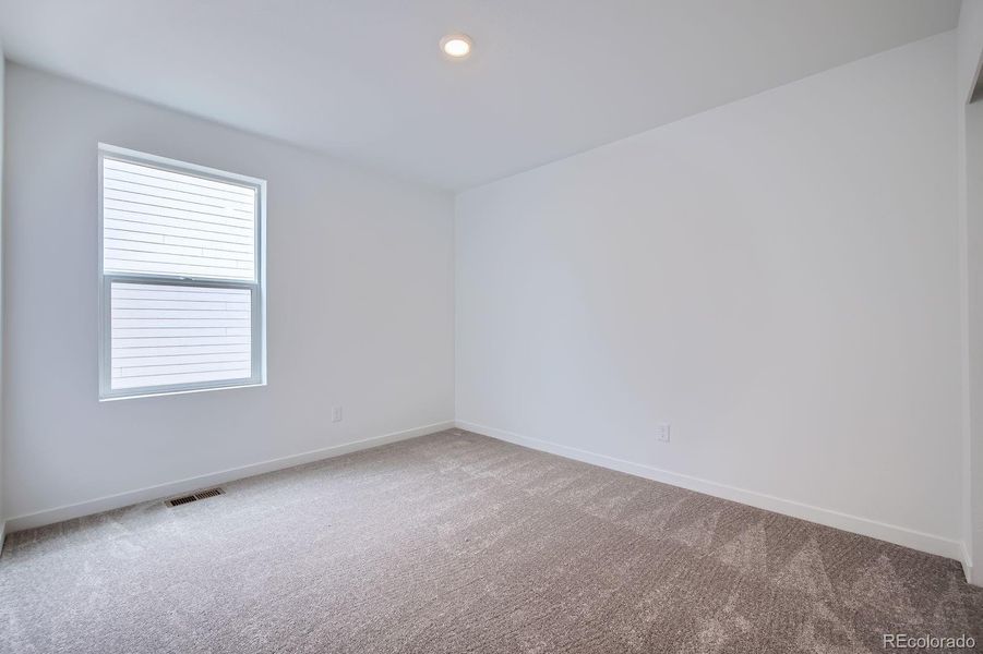 Spacious, unfurnished interior of a new home in Percheron: The Camden Collection, Colorado Springs (Image 9).