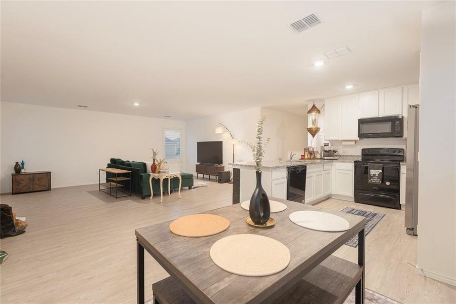 Furnished interior view inside a new home in Tillage Farms, Princeton (Image 7).