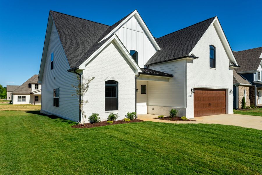 Representative exterior photo of a completed home built from the Aberdeen by Rockwood Homes in Cherry Fields, Clarksville, TN (Image 2). Representative exterior photo of a completed home built from the Aberdeen by Rockwood Homes in Cherry Fields, Clarksville, TN (Image 2).
