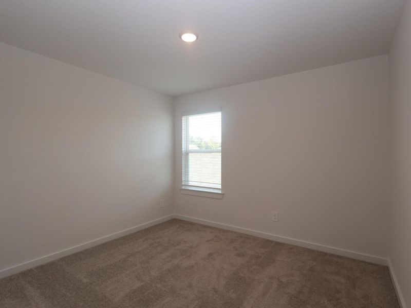 Spacious, unfurnished interior of a new home in Pinewood at Grand Texas, New Caney (Image 19).