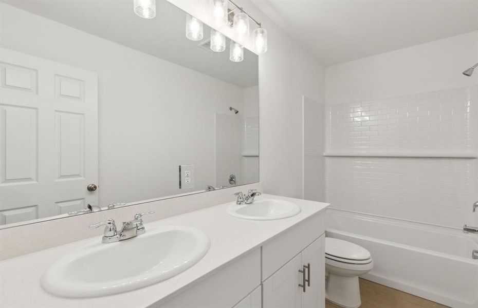 Upgraded secondary bathroom with premium finsihes *real home pictured