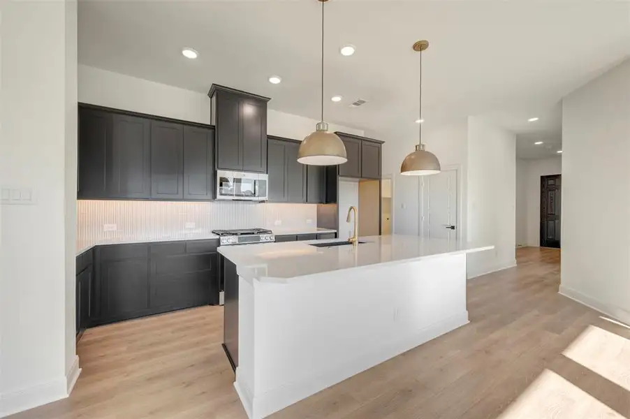 Furnished interior view inside a new home in Creekshaw – Classic, Royse City (Image 13).