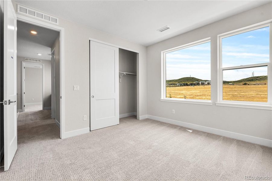 Spacious, unfurnished interior of a new home in Storytellers at Lyric, Lone Tree (Image 33).