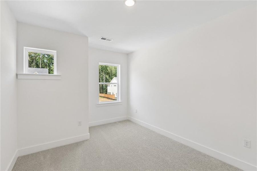 Spacious, unfurnished interior of a new home in Settingdown Farms, Cumming (Image 16).
