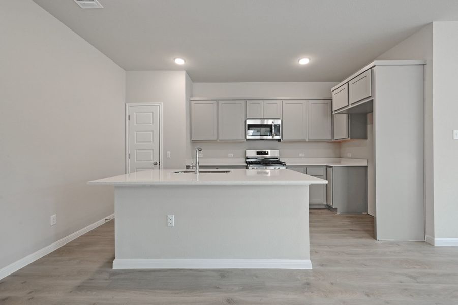 Kitchen in the Willow home plan by Trophy Signature Homes – REPRESENTATIVE PHOTO Kitchen in the Willow home plan by Trophy Signature Homes – REPRESENTATIVE PHOTO