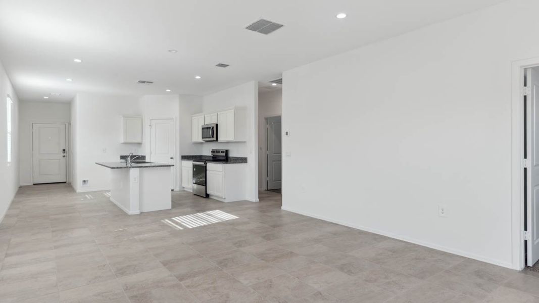 Spacious, unfurnished interior of a new home in Radiance at Superstition Vistas, Apache Junction (Image 8). Spacious, unfurnished interior of a new home in Radiance at Superstition Vistas, Apache Junction (Image 8).