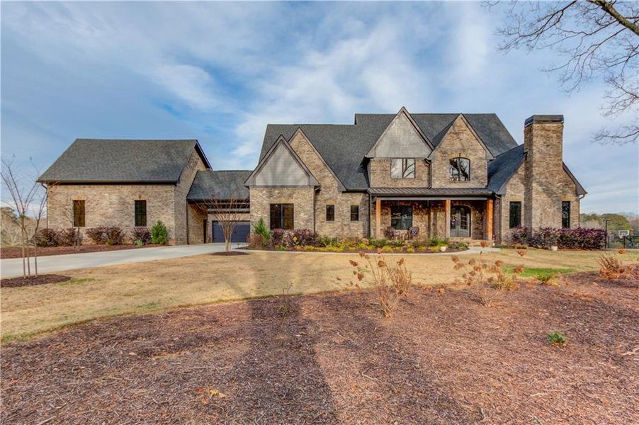 Front exterior of a new home in , Dacula, GA, highlighting curb appeal (Image 1). Front exterior of a new home in , Dacula, GA, highlighting curb appeal (Image 1).