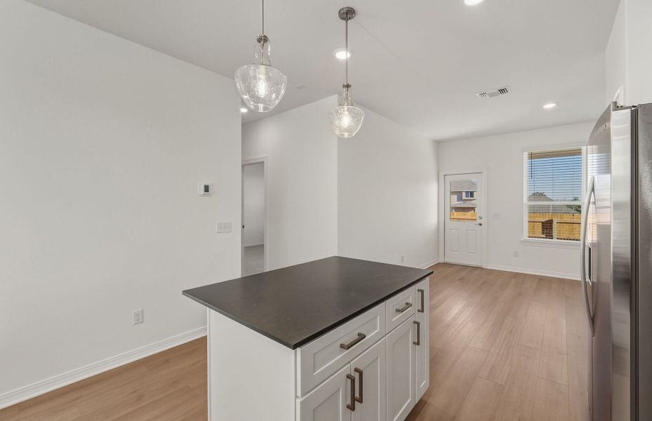 Furnished interior view inside a new home in Crosswinds, Kyle (Image 10).