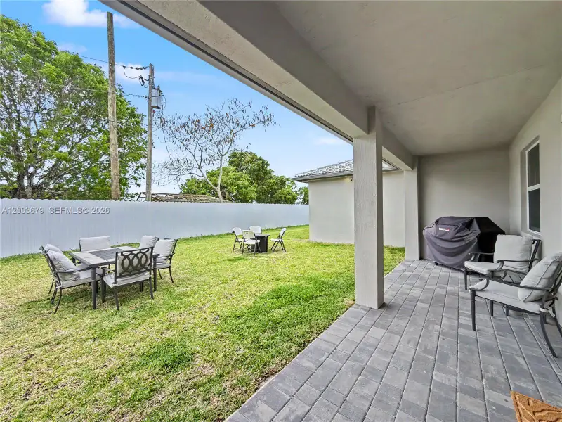 Exterior details and patio area of a home in , Miami (Image 3).