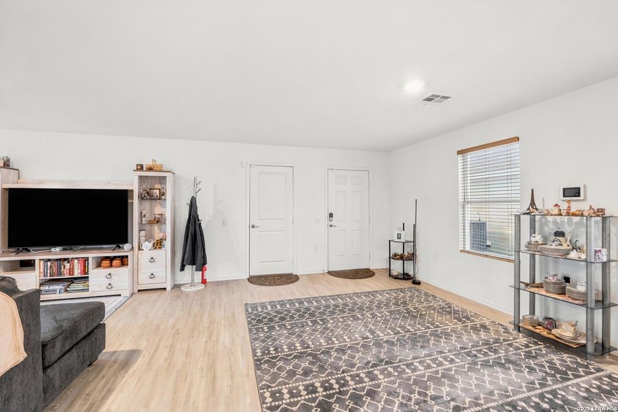 Furnished interior view inside a new home in Tarasco Gardens, San Antonio (Image 16).