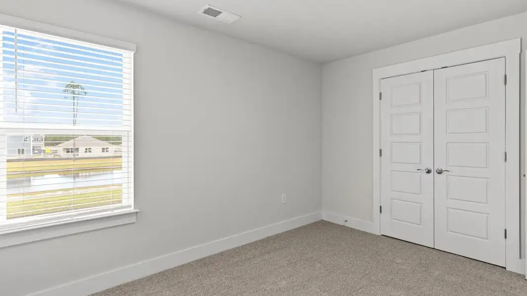 Representative unfurnished interior of a home built from the Wren by D.R. Horton in Saunders Village, Northwest (Image 29).