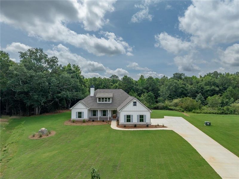 Front exterior of a new home in , Social Circle, GA, highlighting curb appeal (Image 22).