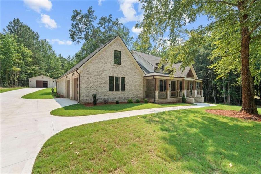 Front exterior of a new home in , Carrollton, GA, highlighting curb appeal (Image 28).
