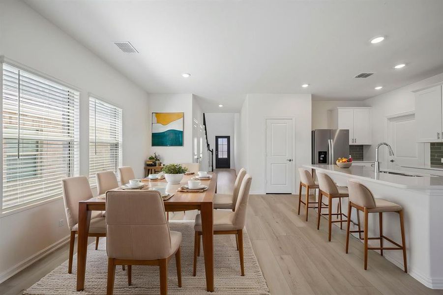 Furnished interior view inside a new home in Parks at Foster Crossing - Spring Series, Anna (Image 6).