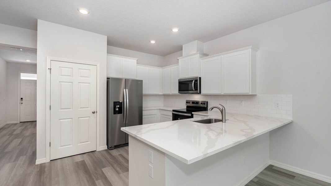 Furnished interior view inside a new home in Orchid Reserve, Sebastian (Image 6).