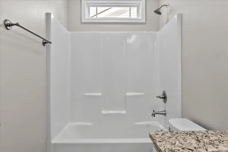 Representative interior finishes for a home built from the Cherokee by Enchanted Homes in Lonesome Dove, San Antonio (Image 31).