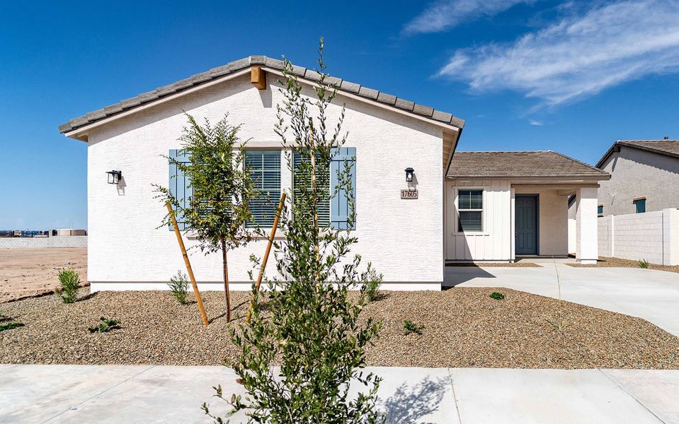 Front exterior of a new home in Rancho Santa Rosa, Maricopa, AZ, highlighting curb appeal (Image 2).