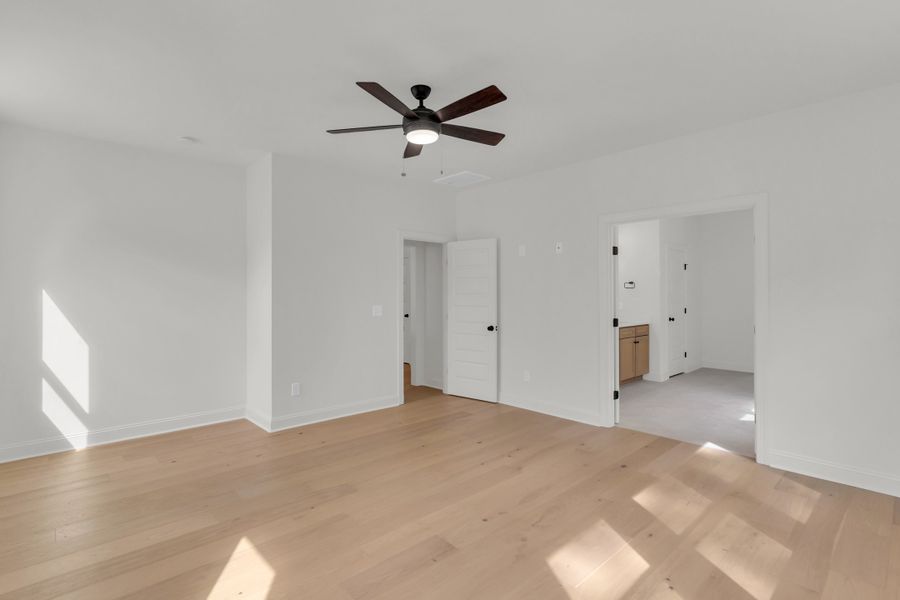 Representative unfurnished interior of a home built from the The Hampton by RobuckHomes in Stonehenge, Raleigh (Image 89).