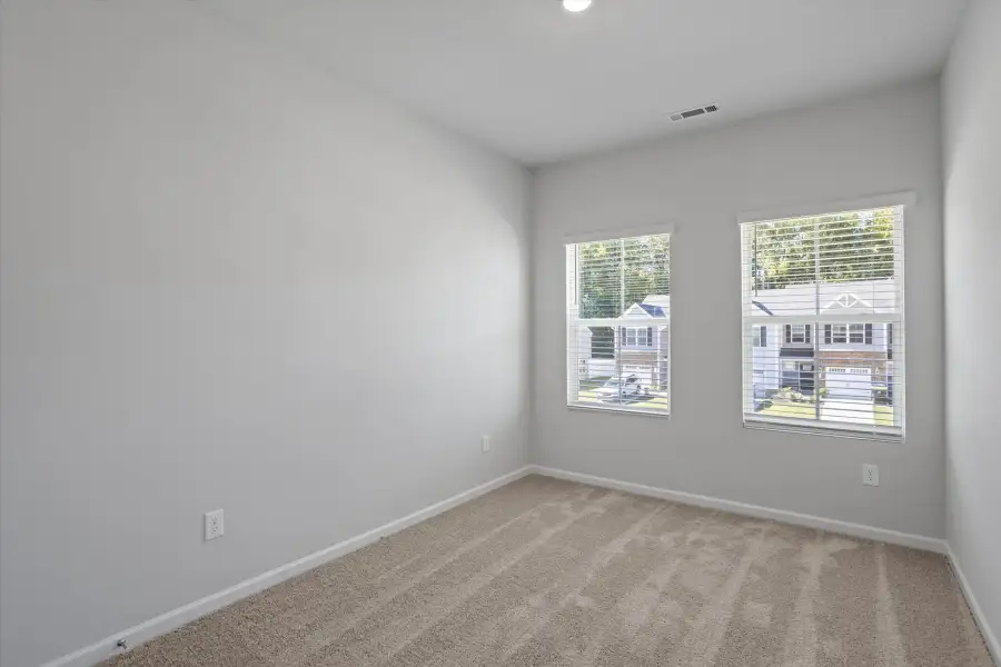 Spacious, unfurnished interior of a new home in West Main Townhomes, Sanford (Image 19).