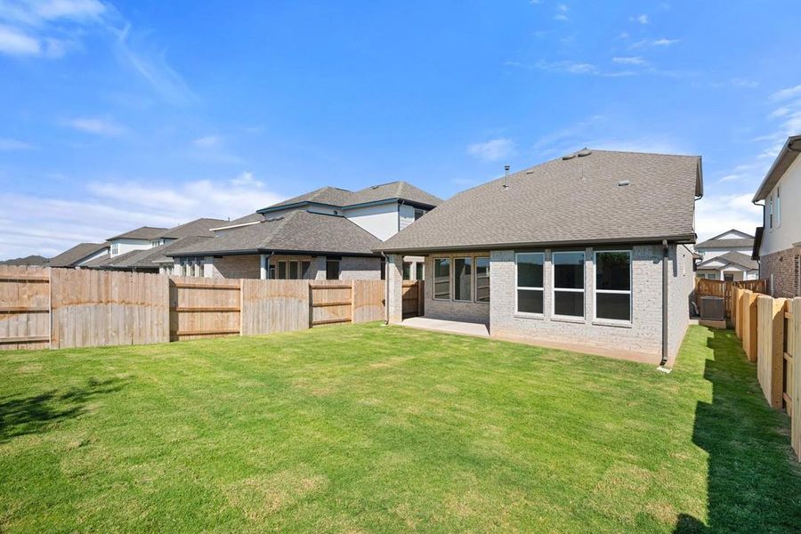 Exterior details and patio area of a home in Flora, Hutto (Image 27).