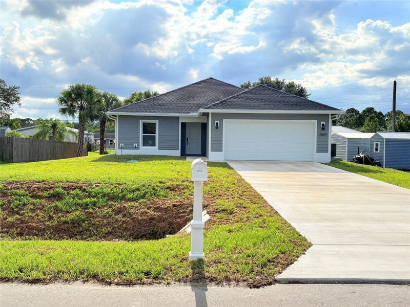 Front exterior of a new home in , Okeechobee, FL, highlighting curb appeal (Image 2).