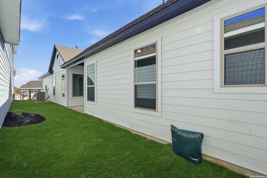 Exterior details and patio area of a home in The Crossvine, Schertz (Image 3).