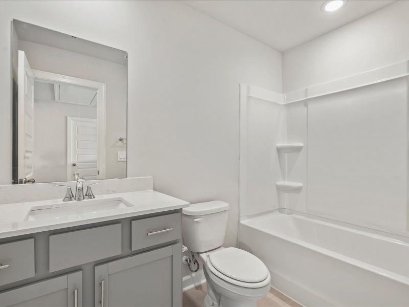 Furnished interior view inside a new home in Waterside - Boardwalk Series, Longs (Image 7).