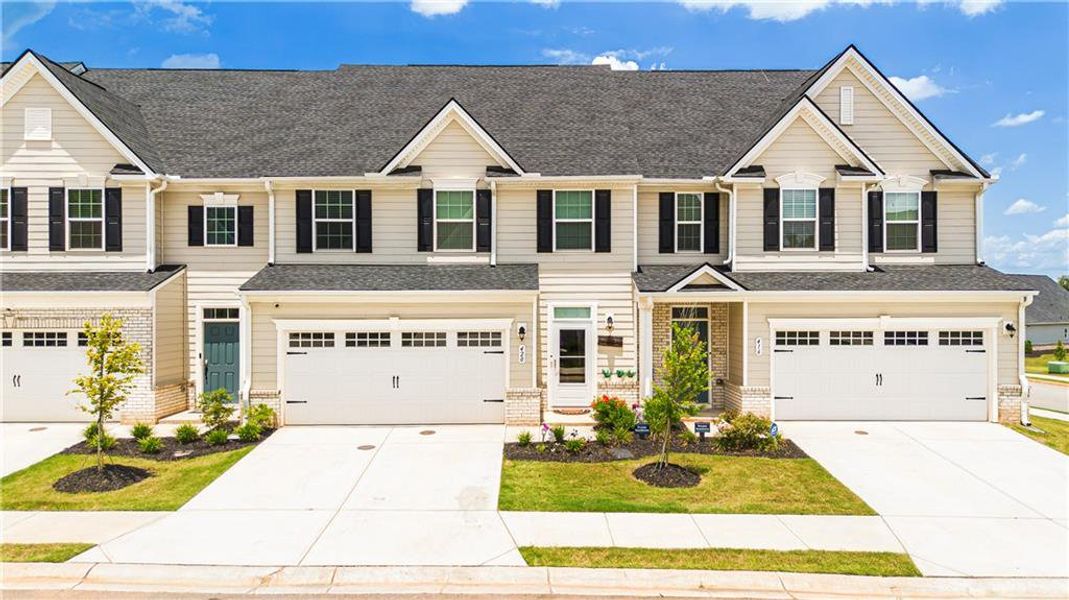 Front exterior of a new home in , McDonough, GA, highlighting curb appeal (Image 1). Front exterior of a new home in , McDonough, GA, highlighting curb appeal (Image 1).