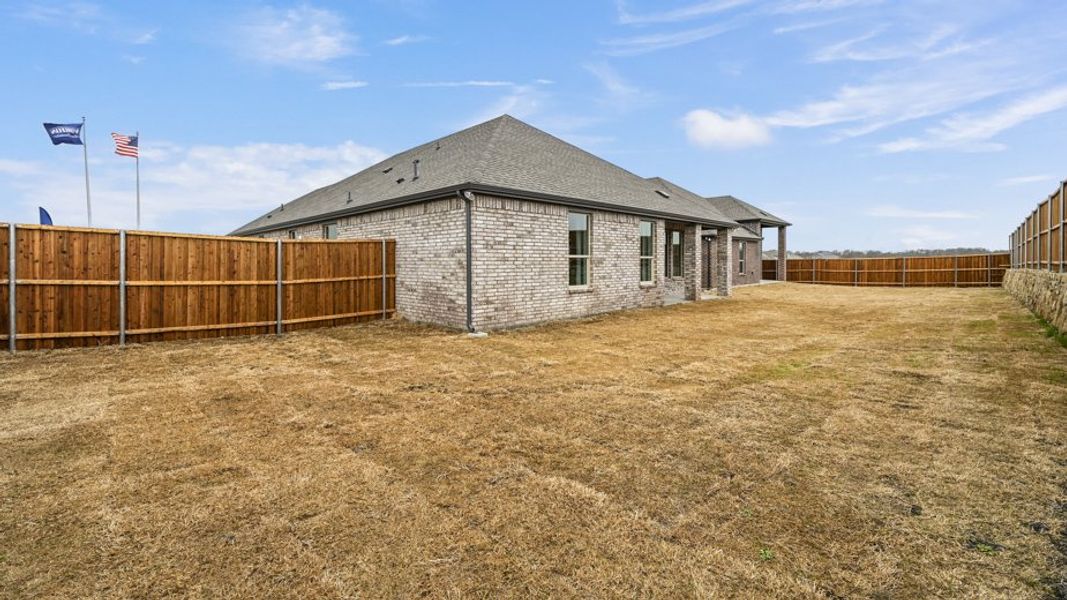 Representative exterior photo of a completed home built from the Vail by D.R. Horton in Madera, Royse City, TX (Image 28). Representative exterior photo of a completed home built from the Vail by D.R. Horton in Madera, Royse City, TX (Image 28).