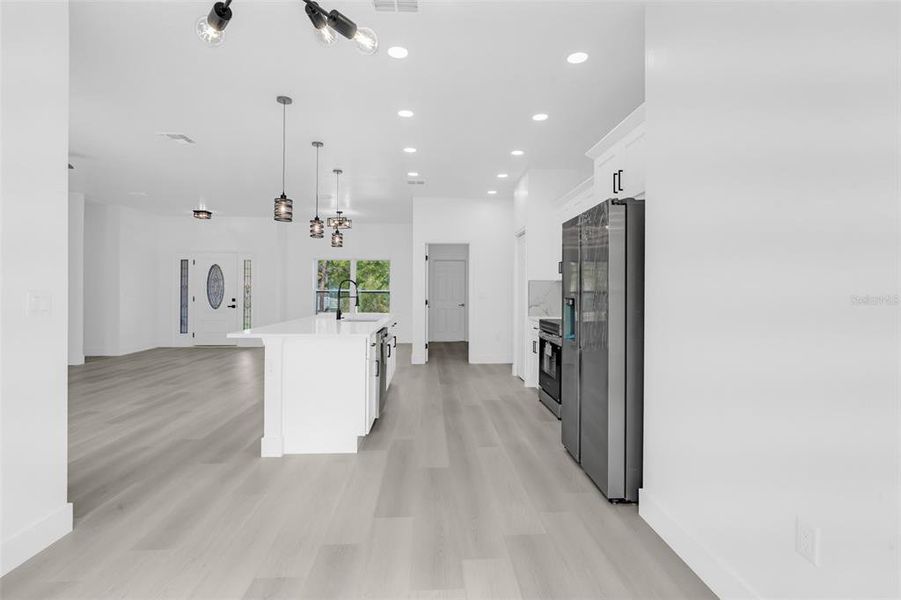 Furnished interior view inside a new home in , Weeki Wachee (Image 7).