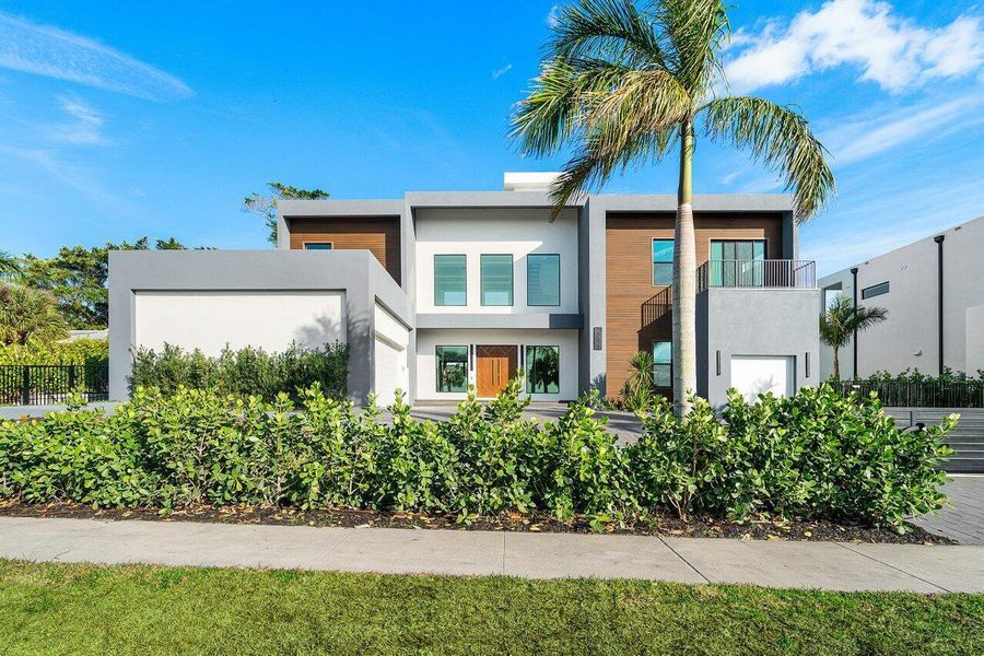 Front exterior of a new home in , Juno Beach, FL, highlighting curb appeal (Image 27).