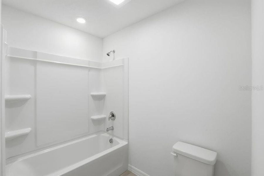 Furnished interior view inside a new home in Waterstone, Groveland (Image 18). Furnished interior view inside a new home in Waterstone, Groveland (Image 18).