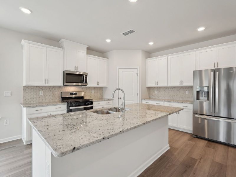 Furnished interior view inside a new home in Northwoods at Mirror Lake, Villa Rica (Image 4).