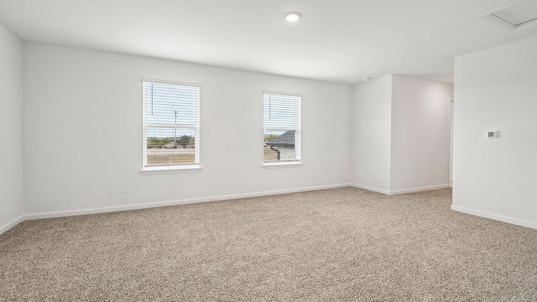 Spacious, unfurnished interior of a new home in Revelry, Del Valle (Image 27).