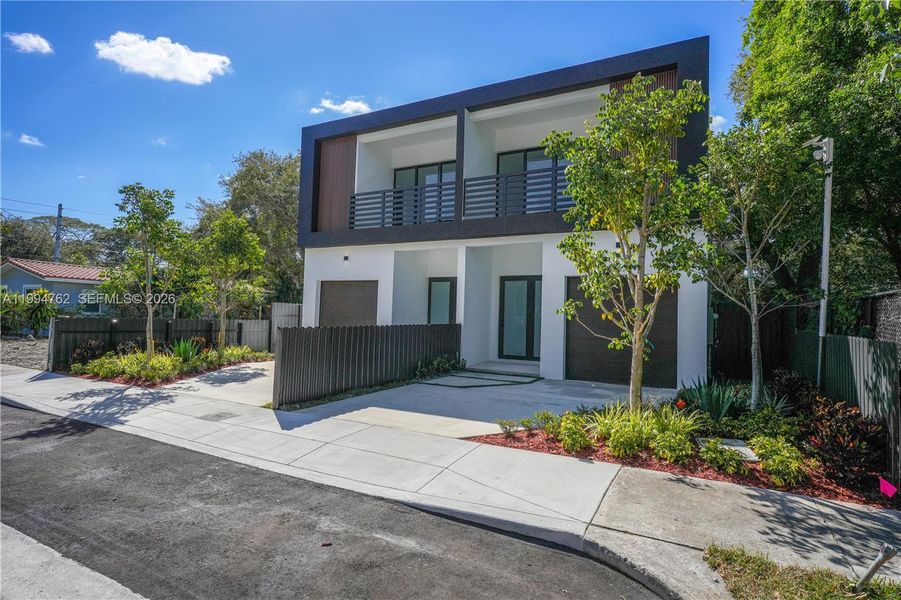 Front exterior of a new home in , Miami, FL, highlighting curb appeal (Image 26).