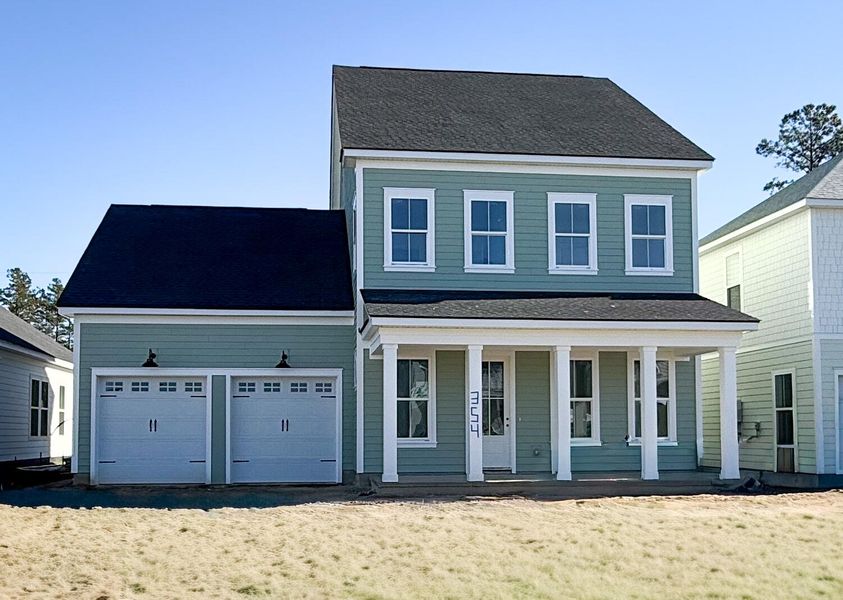 Front exterior of a new home in Single Family Homes at Nexton, Summerville, SC, highlighting curb appeal (Image 1).