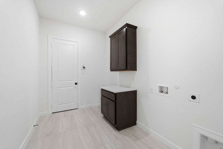 Furnished interior view inside a new home in Green Meadows, Celina (Image 11).