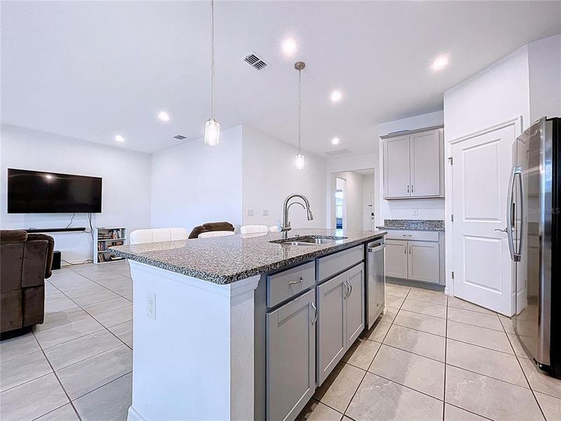 Furnished interior view inside a new home in Covered Bridge at Liberty Bluff, Haines City (Image 11).