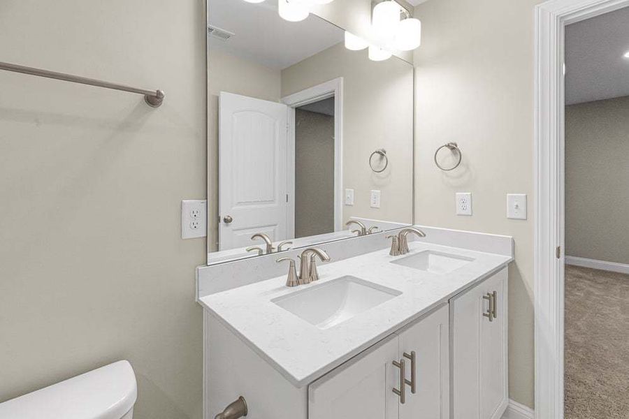 Representative furnished interior of a home built from the Magnolia by Caviness & Cates Communities in Bartlett Manor, Youngsville (Image 49).
